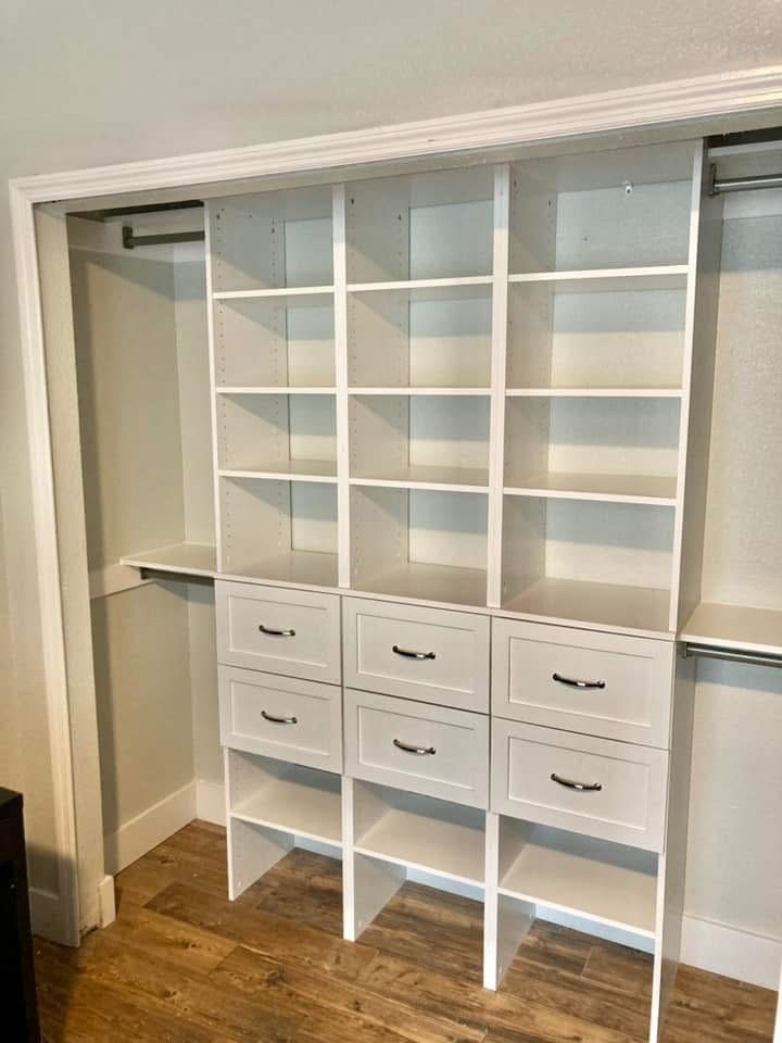 Custom closet built-ins with shelving and drawers